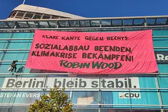 İklim Aktivistleri CDU Çatısına Çıktı: "Sağcılara Karşı Net Duruş"